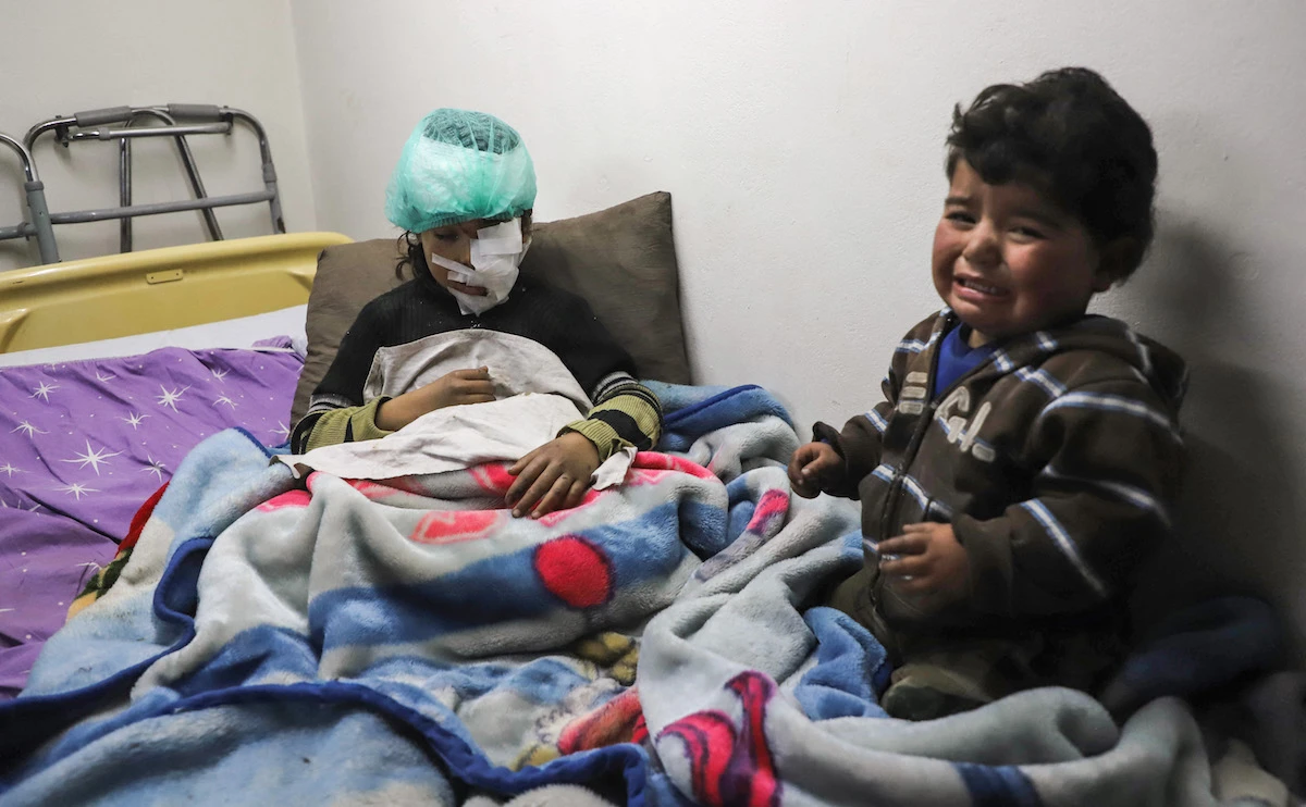 Ten-year-old Syrian child Mariam Othman, after being rescued from the rubble of a building hit by reported regime bombardment. (File/AFP)