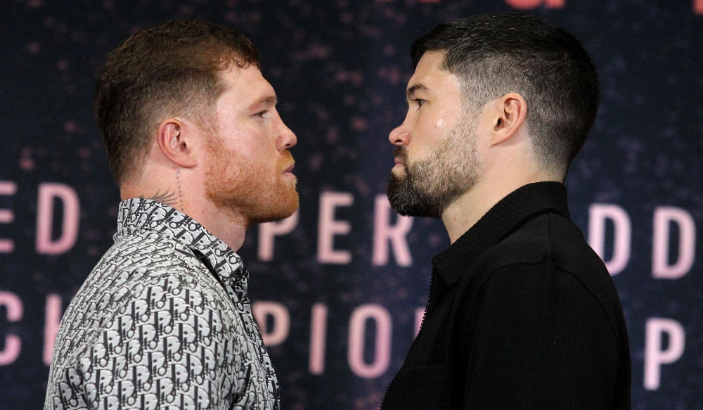 Mexican boxer Saul Canelo Alvarez (L) and English boxer John Ryder face off during a press conference to present their fight on May 6, in Zapopan, Jalisco state, Mexico, on Tuesday. (AFP)