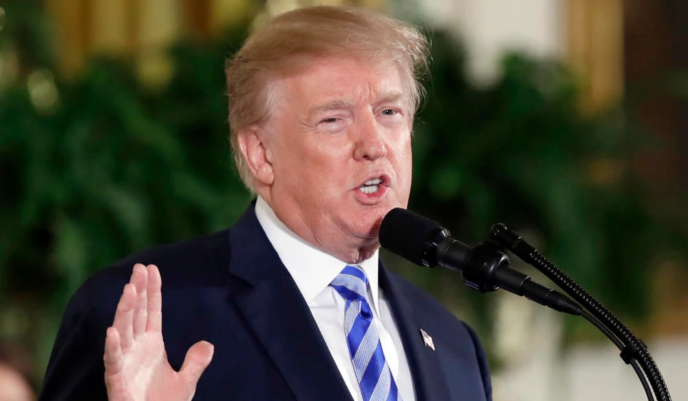 President Donald Trump speaks in the East Room of the White House in Washington on Feb. 20, 2018. (AP)