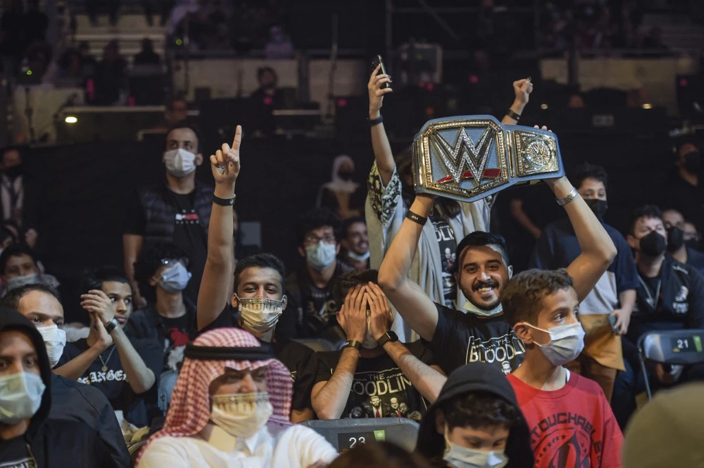 Spectators attend the 2022 WWE Elimination Chamber at the Jeddah Super Dome on Feb. 19, 2022. (AFP)
