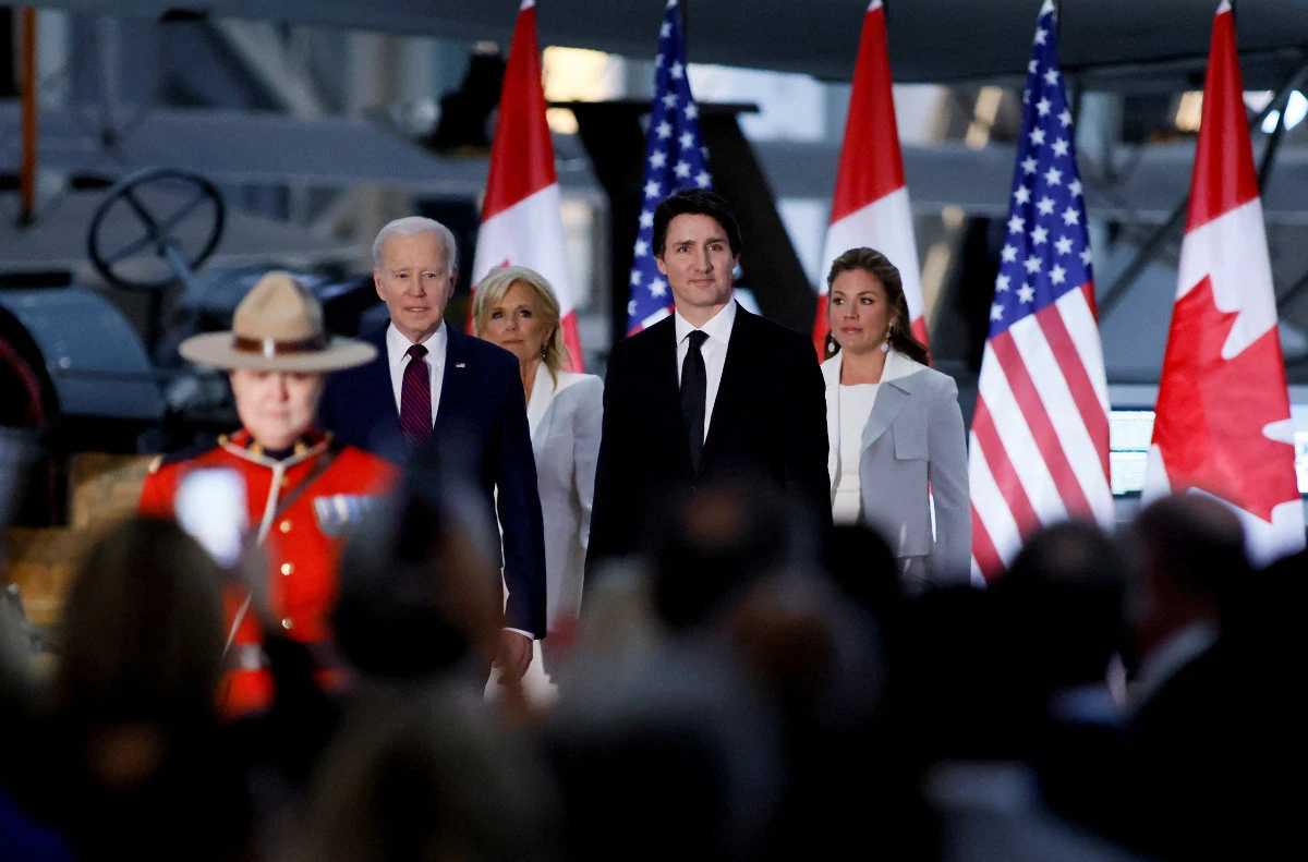 US President Joe Biden and Canadian Prime Minister Justin Trudeau, accompanied by their wives, arrive to attend a gala dinner in Ottawa, Canada on March 24, 2023. (REUTERS)