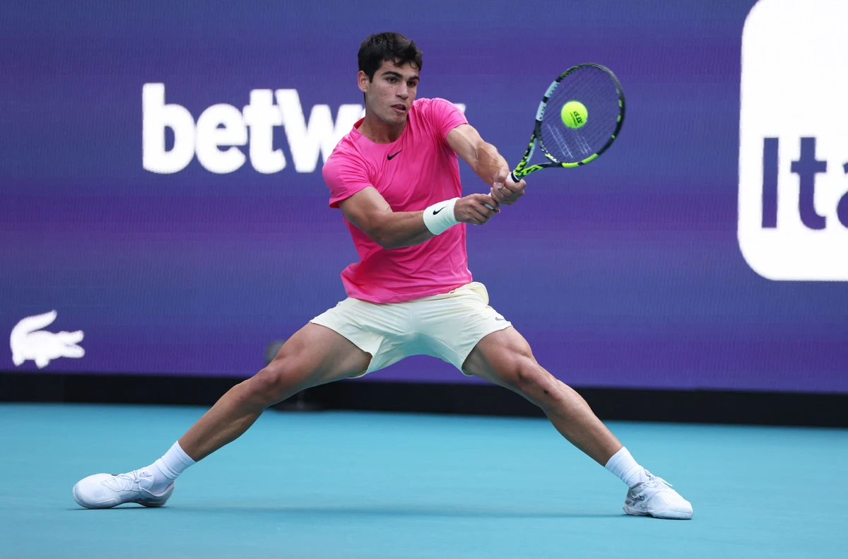 Carlos Alcaraz of Spain plays a backhand against Facundo Bagnis of Argentina in their second round match at Hard Rock Stadium in Miami Gardens, Florida. (AFP)
