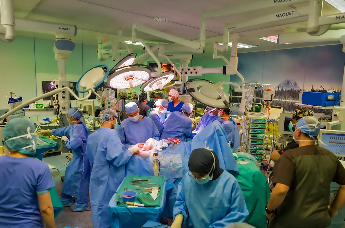 Specialist surgeons work to separate conjoined twins at a hospital in Riyadh on May 15, 2022. (KSrelief handout picture))