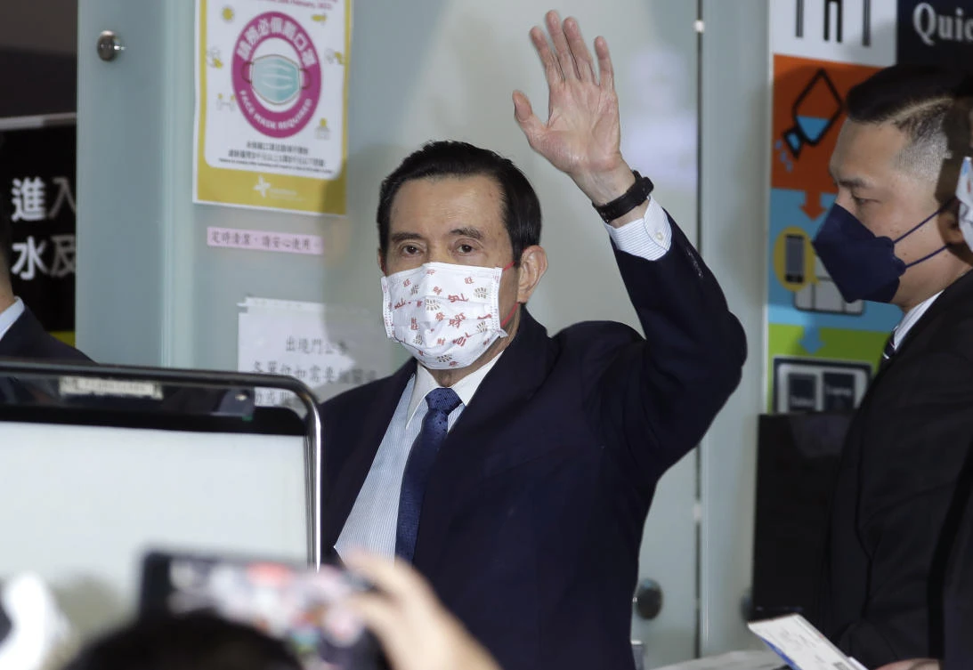 Former Taiwan President Ma Ying-jeou waves as Ma leaves for China, at Taoyuan International Airport in Taoyuan City, northern Taiwan, Monday, March 27, 2023. (AP)