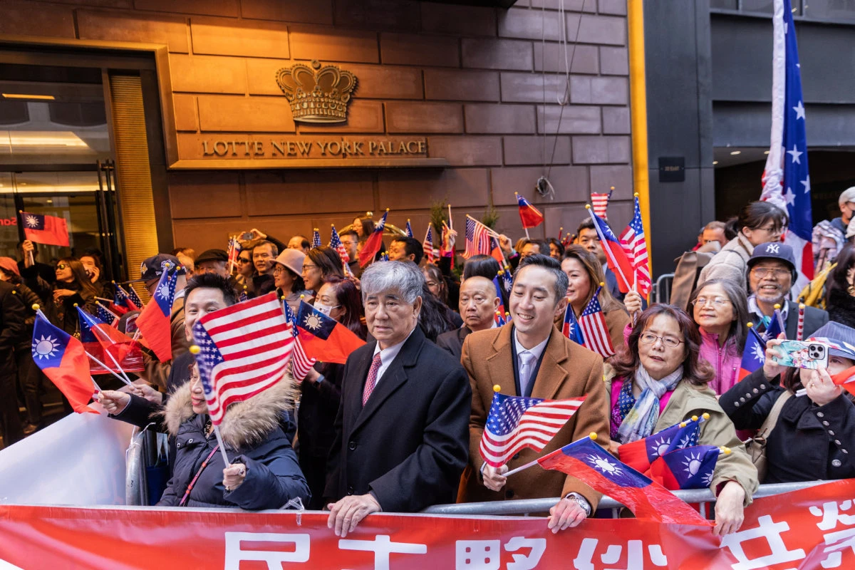 Taiwan president welcomed, denounced by Chinese community in New York as she arrives for a stopover