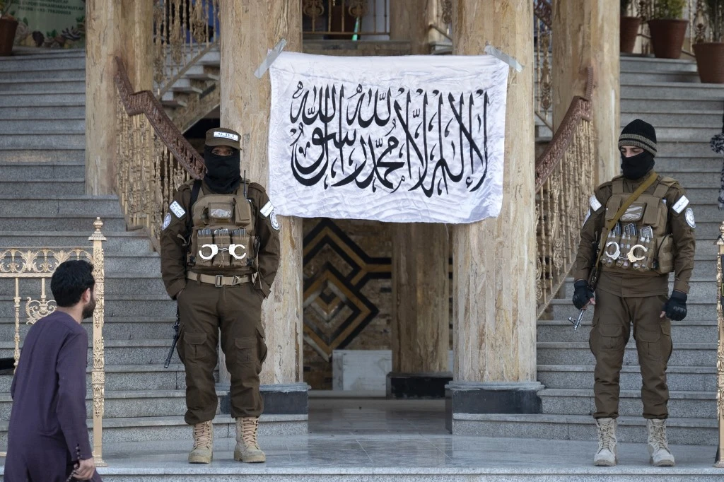 In Taliban-ruled Afghanistan, many of those seeking to relocate to Britain face significant danger in approaching government ministries for the requisite documents. (AFP)
