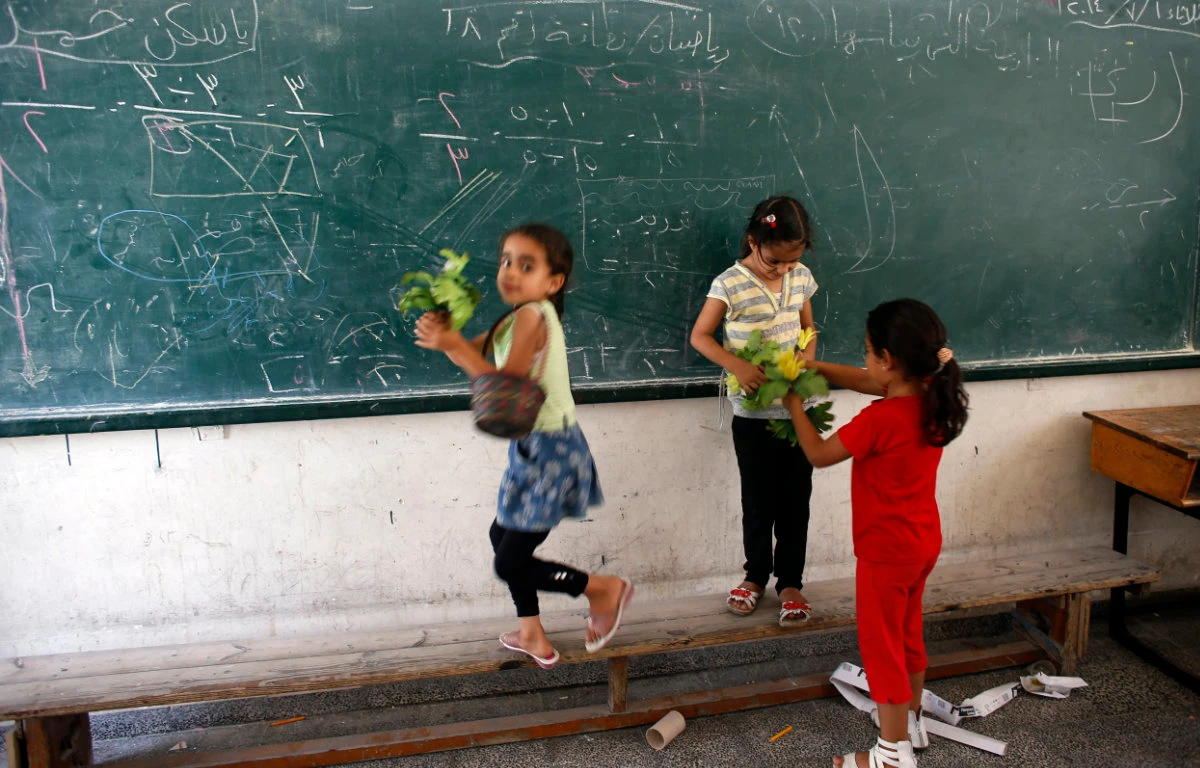 Palestinian children attending a class at an UNWRA school in Gaza. (AFP file)