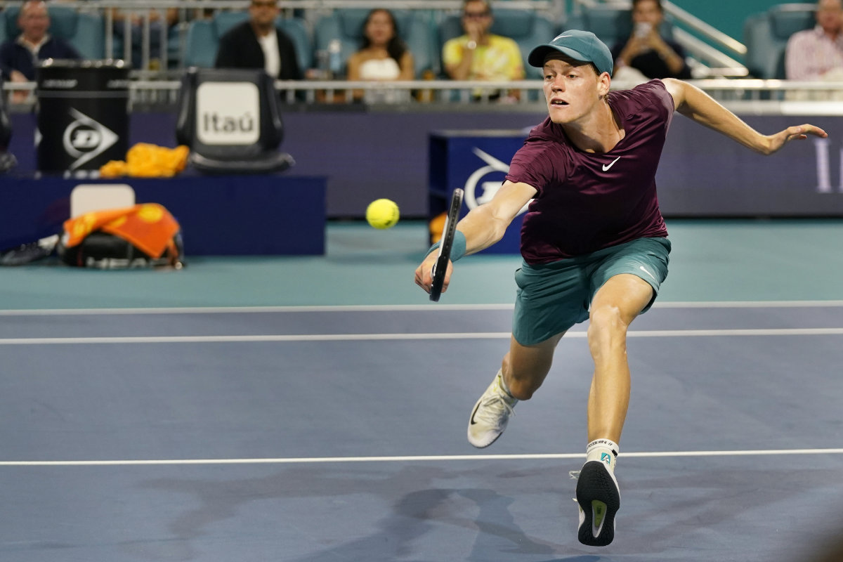 Jannik Sinner returns a shot from Carlos Alcaraz during the Miami Open semifinal match on March 31, 2023. (AP Photo)