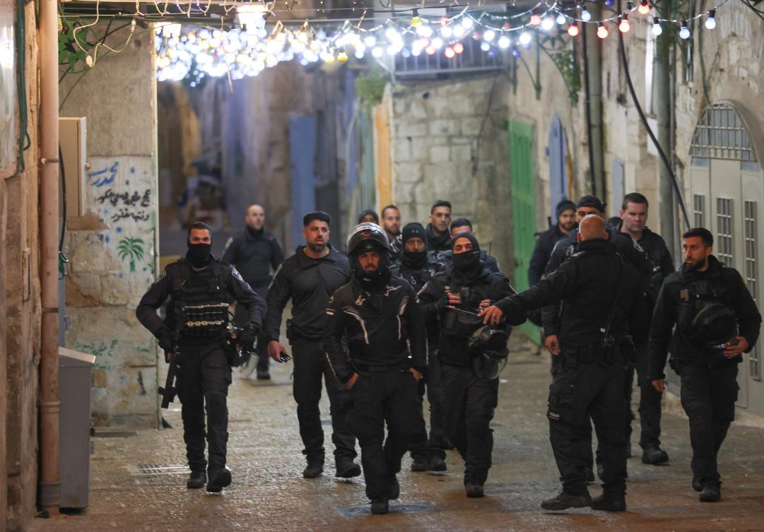 Israeli police forces deploy in the Old City in annexed east Jerusalem after a reported shooting incident. (AFP)