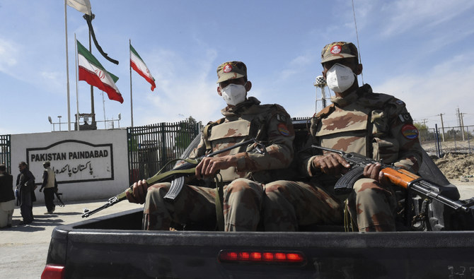 Pakistani soldiers patrol near the Pakistan-Iran border on Feb. 25, 2020. Pakistan's army said on Saturday that attackers from Iran killed four of its border patrol soldiers. (AFP/File)
