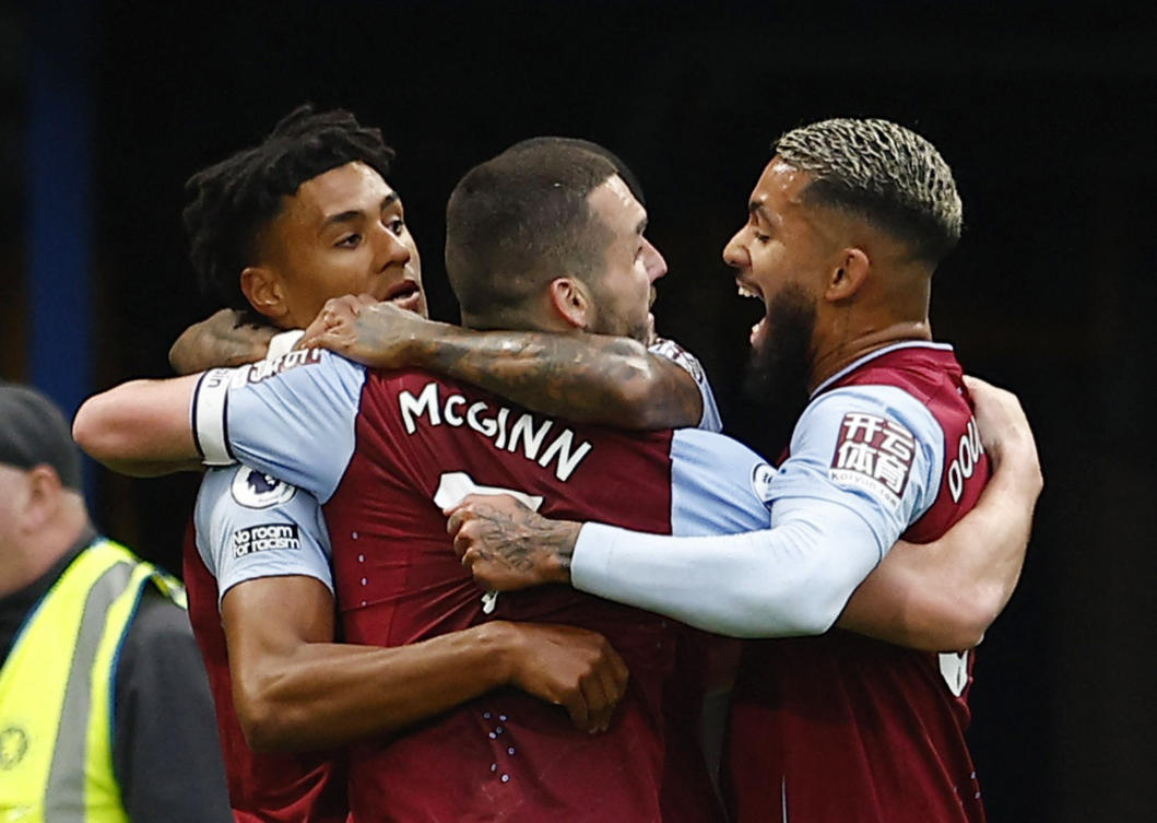 Aston Villa’s Ollie Watkins celebrates scoring their first goal with John McGinn and Douglas Luiz Soccer during their Premier League match against Chelsea at Stamford Bridge on Apr. 1, 2023. (Reuters)