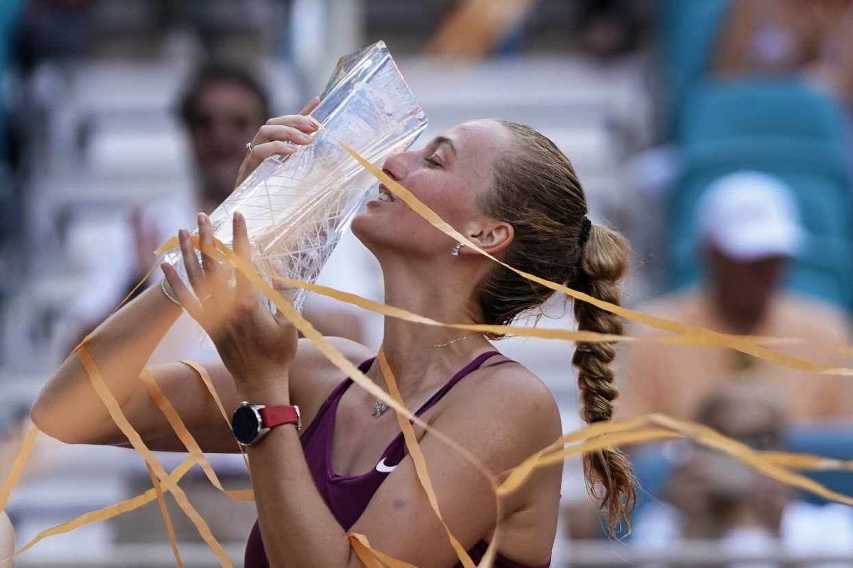 Petra Kvitova, of the Czech Republic, kisses her trophy after she beat Elena Rybakina, of Kazakhstan, during the women's singles finals of the Miami Open tennis tournament, Saturday, April 1, 2023, in Miami Gardens, Fla. (AP)