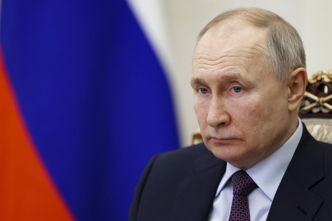 Russian President Vladimir Putin attends a ceremony to open new pharmaceutical production facilities in the Kaliningrad Region, Mordovia and St. Petersburg via videoconference in Moscow, Russia, Thursday, March 30, 2023. (AP)