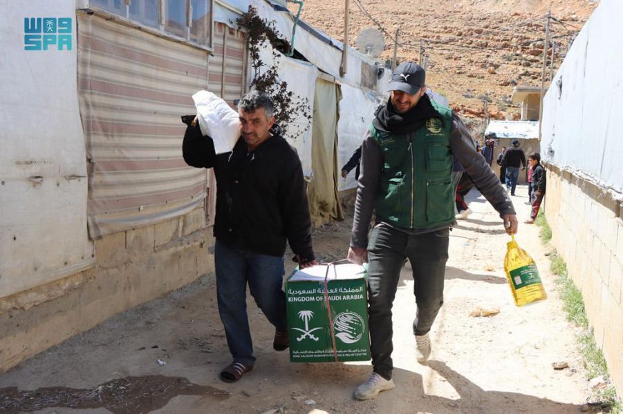 In Lebanon, Syrian and Palestinian refugees as well as the host community in Arsal town of Beqaa governorate received about 84 tons of food baskets. (SPA)