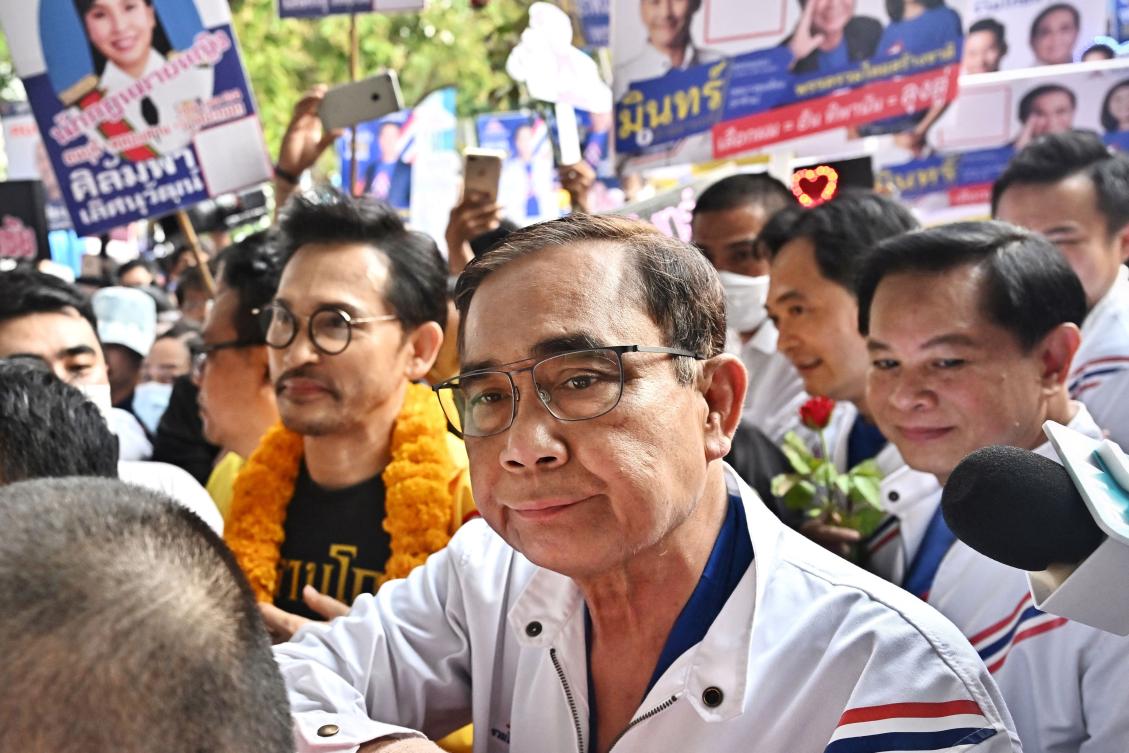 Thai Prime Minister Prayut Chan-O-Cha, center, and his party are lagging in the polls. (AFP)