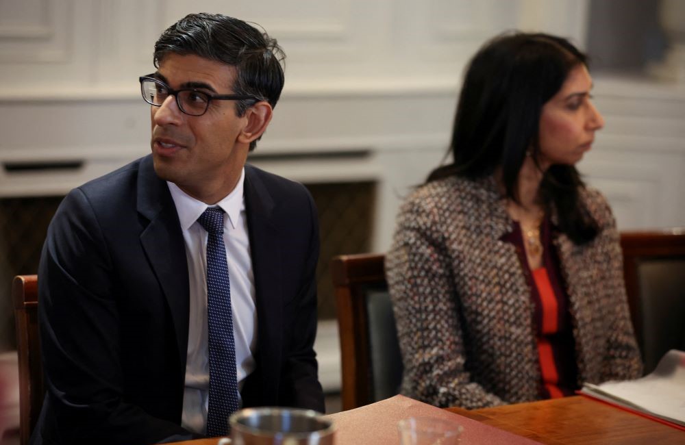 Rishi Sunak and Suella Braverman attend a meeting following the announcement of a new police task force to help officers tackle grooming gangs, in Rochdale, Britain, April 3, 2023. (Reuters)