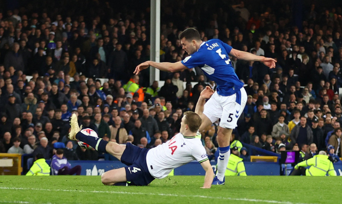 Everton's Michael Keane scores their first goal during the Premier League match against Tottenham Hotspur at Goodison Park, Liverpool, on Monday. (Reuters)