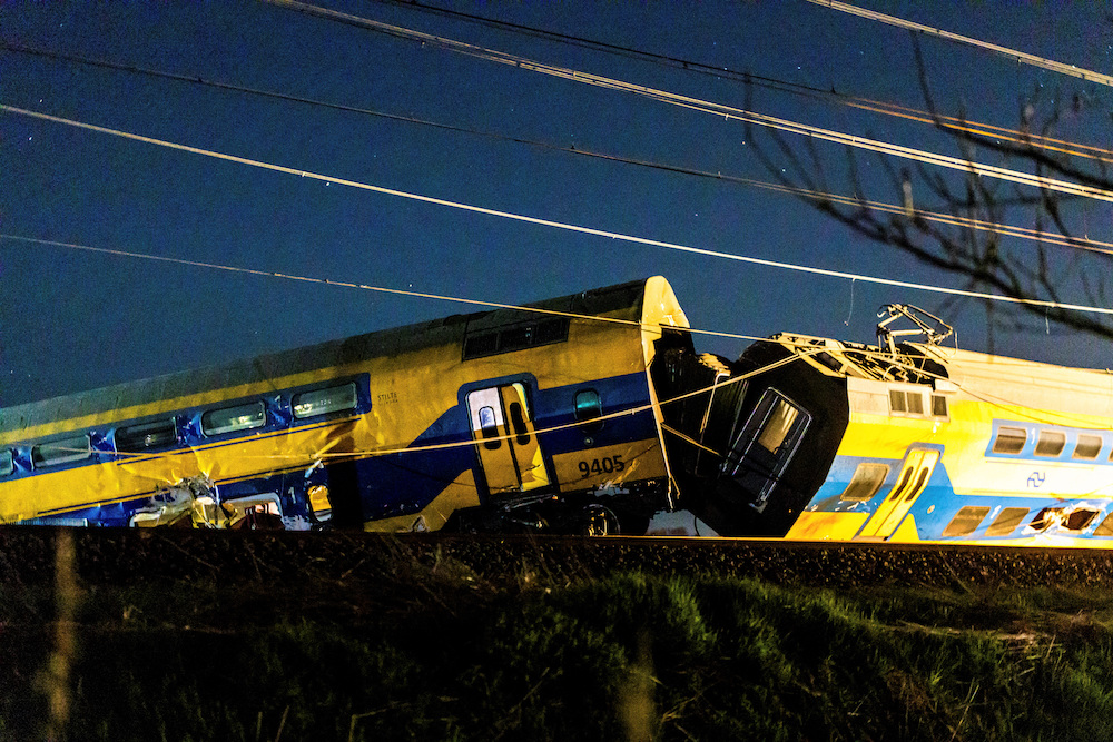 The front carriage of the night train from Leiden city to The Hague derailed and plowed into a field after the accident. (Kyrlian De Bot via Reuters)