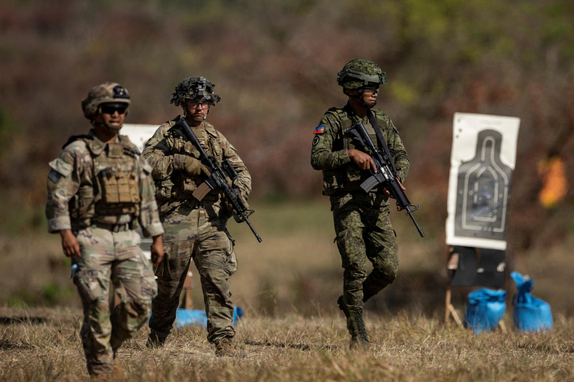 US and Philippine troops participate in a squad live fire exercise at the three-week joint military drills in Fort Magsaysay, Nueva Ecija on March 31, 2023. (Reuters)
