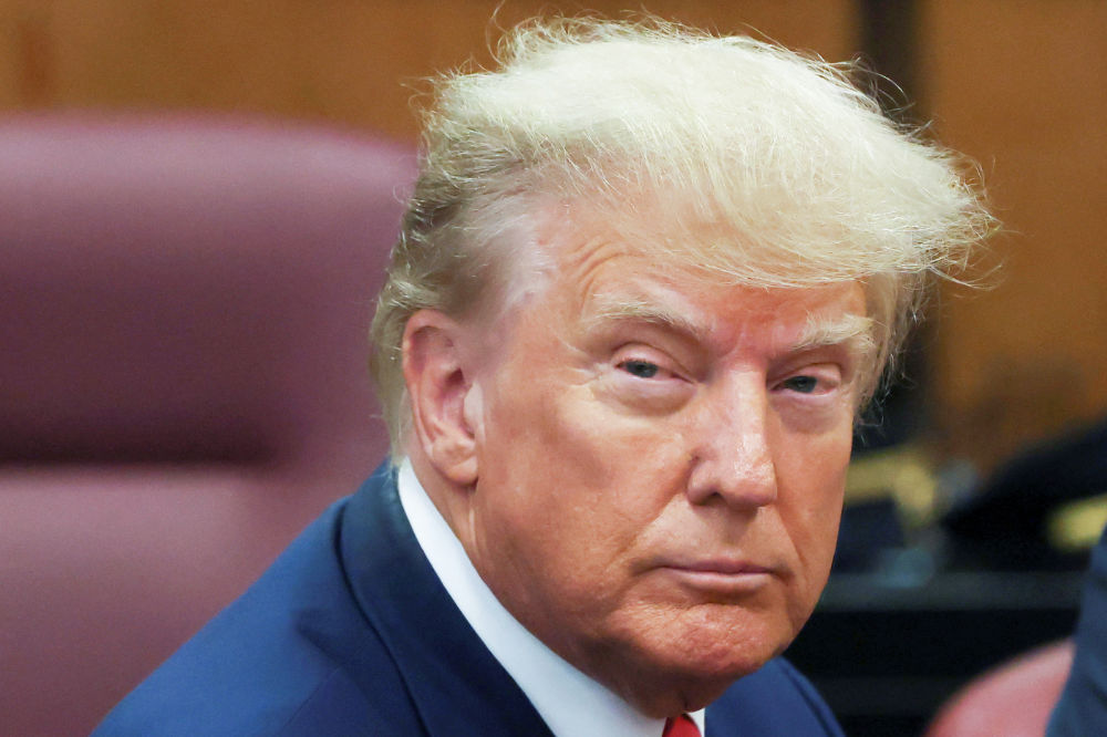Former US President Donald Trump appears in court for an arraignment on charges stemming from his indictment by a Manhattan grand jury following a probe into hush money paid to porn star Stormy Daniels, in New York City, US., April 4, 2023. (REUTERS)
