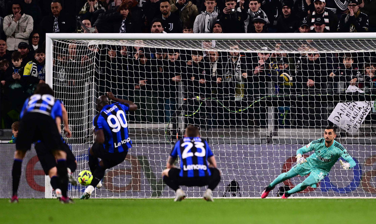 Inter Milan forward Romelu Lukaku from Belgium scores a penalty during the Italian Cup semifinal first leg between Juventus and Inter Milan on Tuesday at the "Allianz Stadium" in Turin. (AFP)