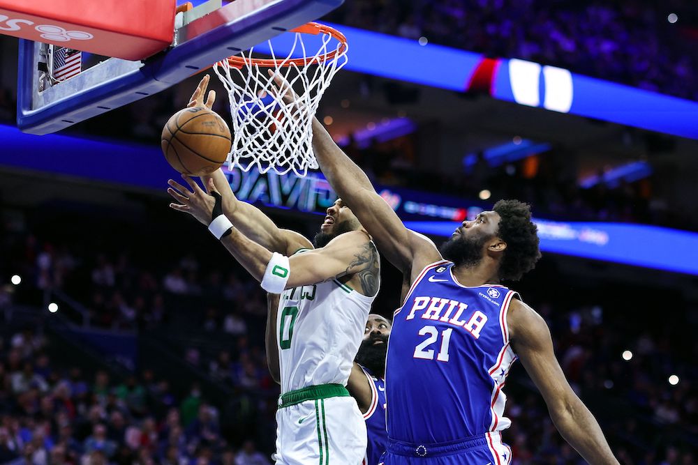 Joel Embiid of the Philadelphia 76ers blocks Jayson Tatum of the Boston Celtics during the third quarter of their NBA game at Wells Fargo Center on Tuesday in Philadelphia, Pennsylvania. (AFP)