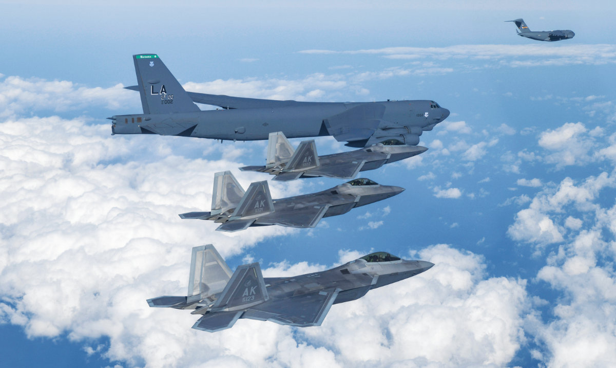 A B-52 bomber, C-17, and F-22 fighter jets fly over the Korean Peninsula during a joint air drill in South Korea in this Dec. 20, 2022 file photo. (AP)
