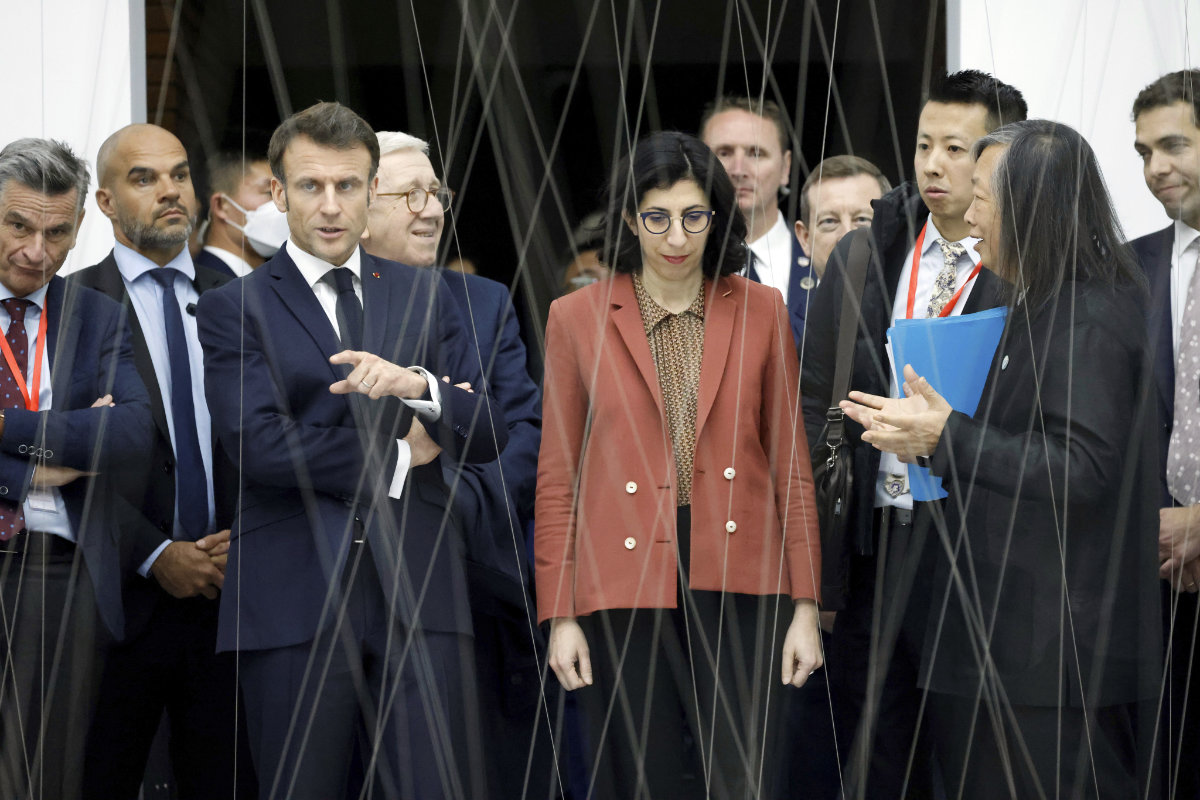 French President Emmanuel Macron visits the Red Brick Museum in Beijing on April 5, 2023. (Pool Photo via AP)