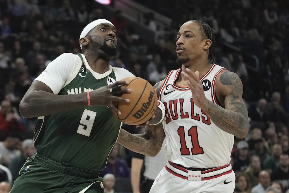 Milwaukee Bucks' Bobby Portis drives past Chicago Bulls' DeMar DeRozan during the first half of an NBA basketball game Wednesday in Milwaukee. (AP)