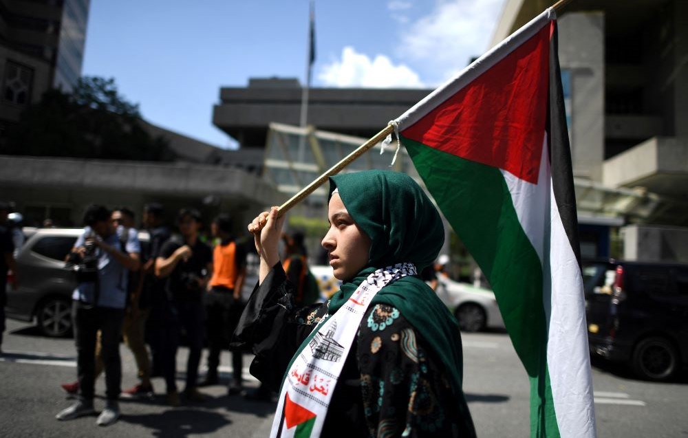 A Palestinian supporter attends a rally in Kuala Lumpur, Malaysia, Dec. 21, 2018. (AFP)