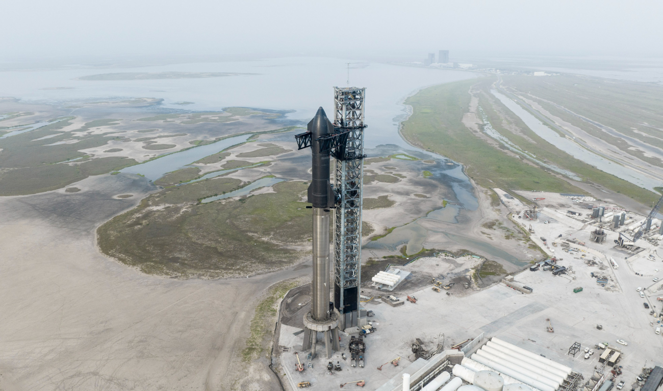 SpaceX conducted a successful test-firing of the 33 Raptor engines on the first-stage booster of Starship in February. (SpaceX)
