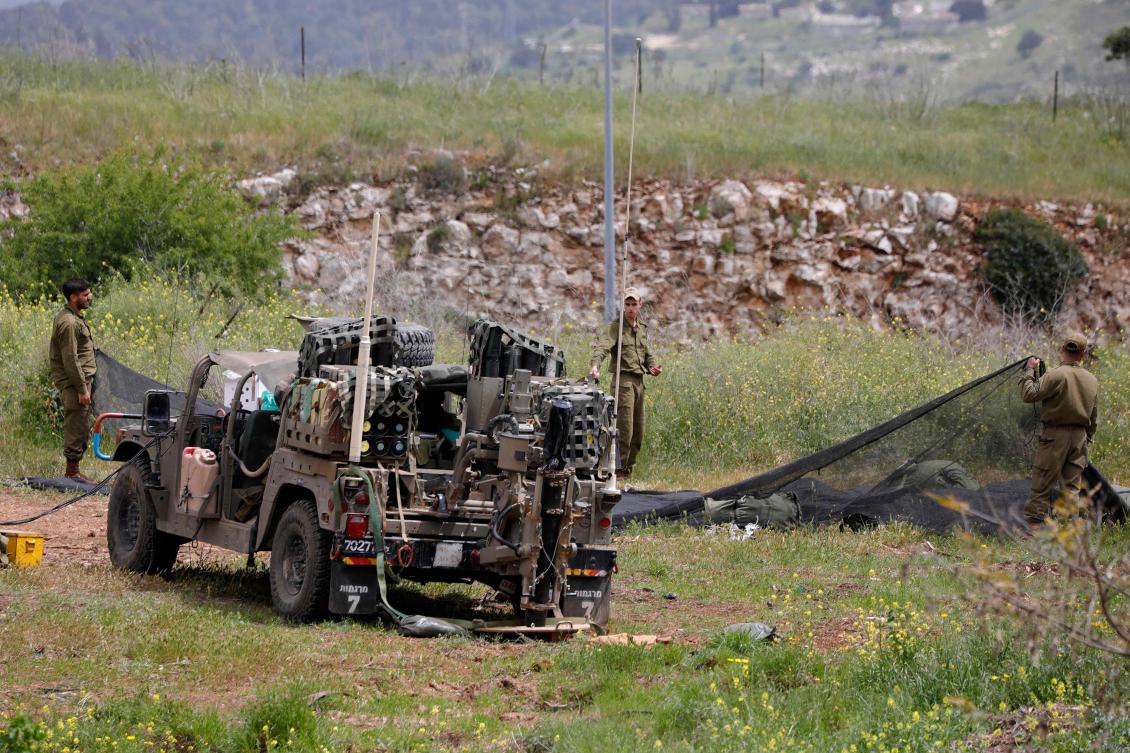 Israeli soldiers deploy in an open area near Kibuttz Malkia, in northern Israel bordering Lebanon, on Apr. 7, 2023. (AFP)