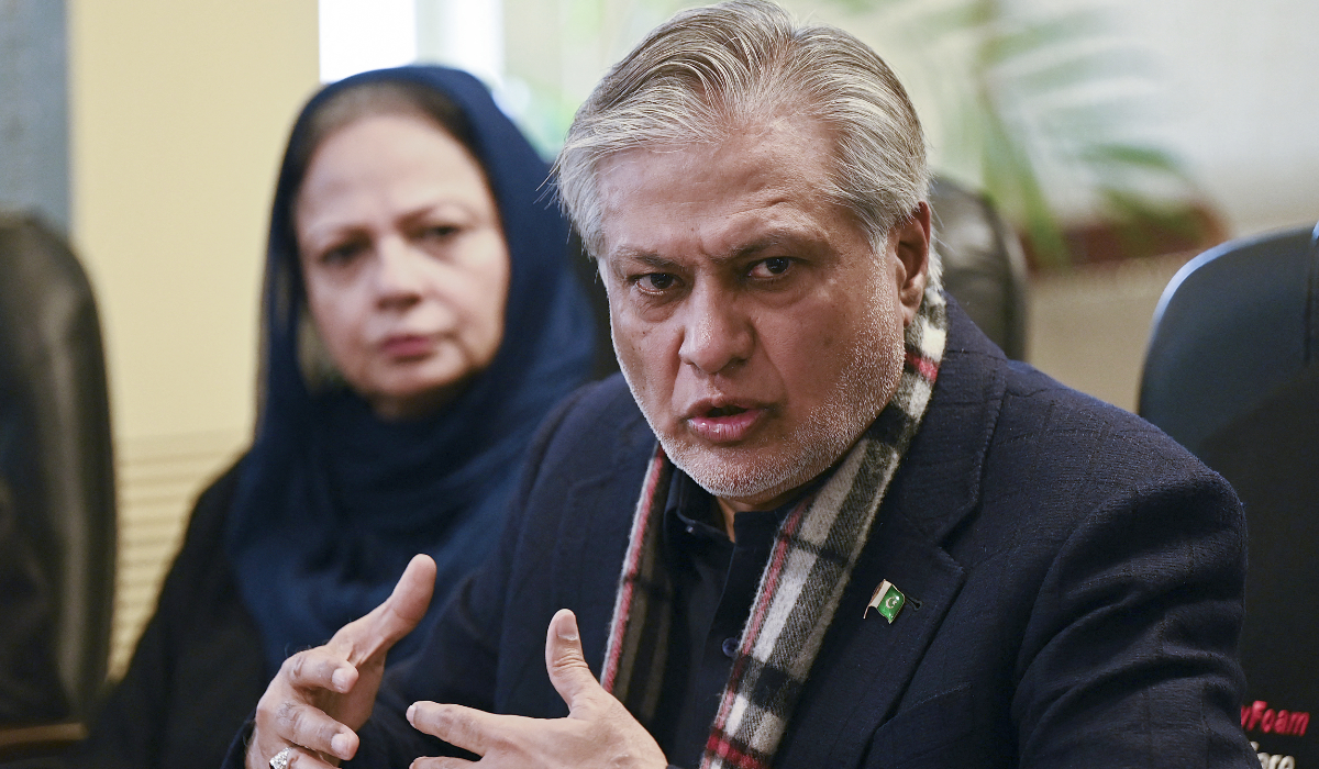Pakistan’s Finance Minister Ishaq Dar (R) speaks during a press conference in Islamabad on February 10, 2023. (AFP)