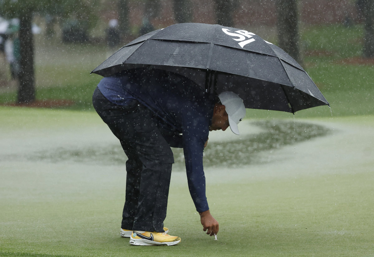 Koepka extends Masters lead to four shots before rain stops play