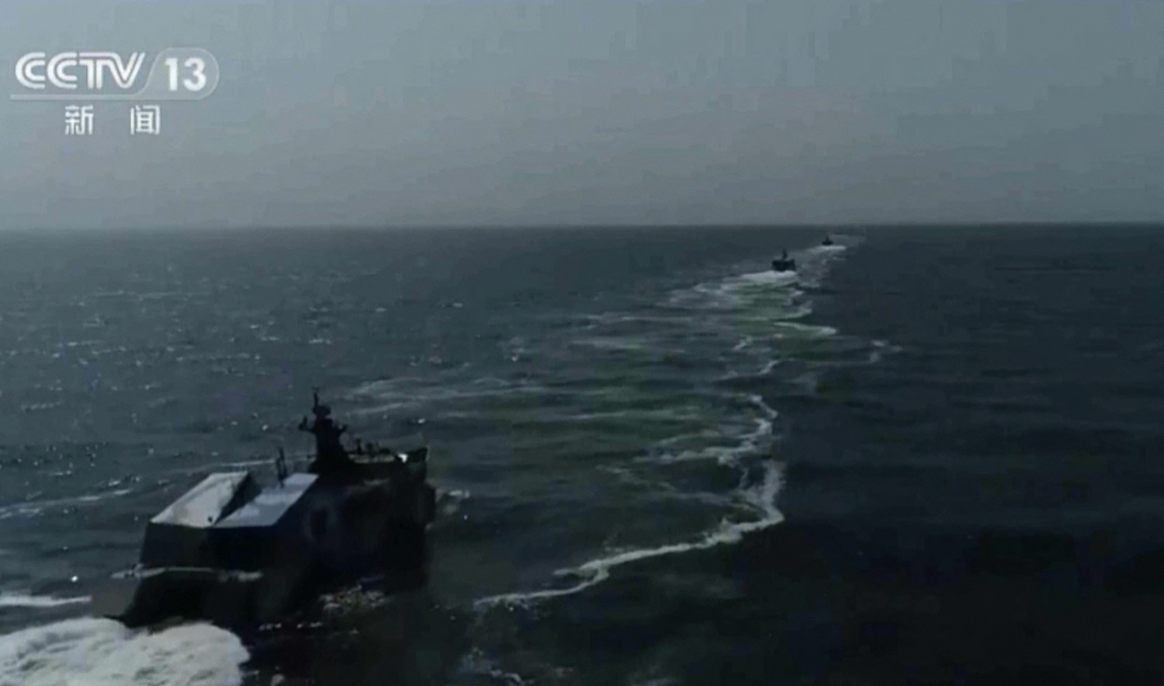 In this image made from video footage made available Sunday, April 9, 2023, by China's CCTV, Chinese navy ships take part in a military drill in the Taiwan Strait. (Photo courtesy: CCTV via AP)