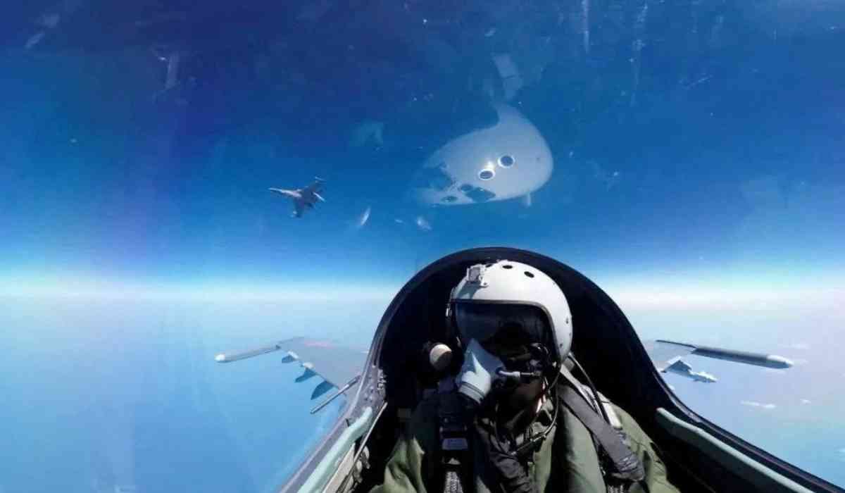 A pilot is photographed operating an aircraft of the Air Force under the Eastern Theatre Command of China's People's Liberation Army (PLA) during a combat readiness patrol and "Joint Sword" exercises around Taiwan, at an undisclosed location in this handout image released on April 8, 2023. (REUTERS)