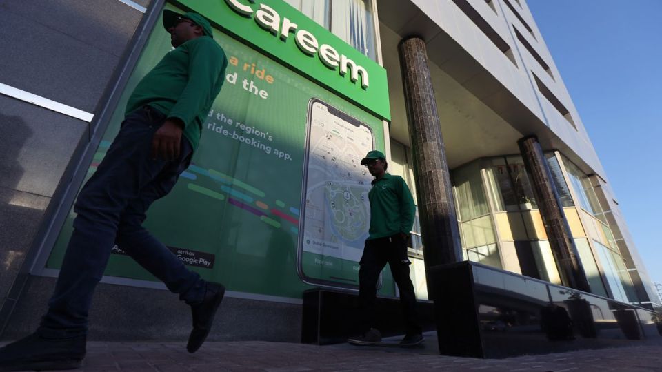 Careem employees walk past the company headquarters in Dubai, UAE, on December 13, 2018. (REUTERS/File)