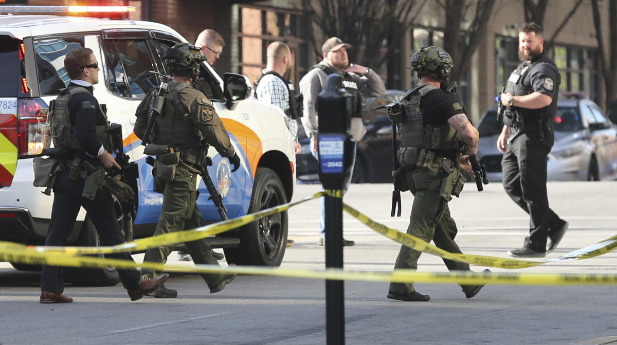Multiple agencies arrive at a building after a shooting took place in Louisville, Ky., Monday, April 10, 2023. (AP)