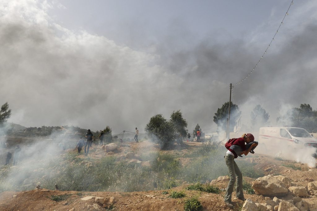 Palestinians clash with Israeli security forces during a protest in the village of Beita, south of Nablus in the occupied West Bank, on April 10, 2023. (AFP)