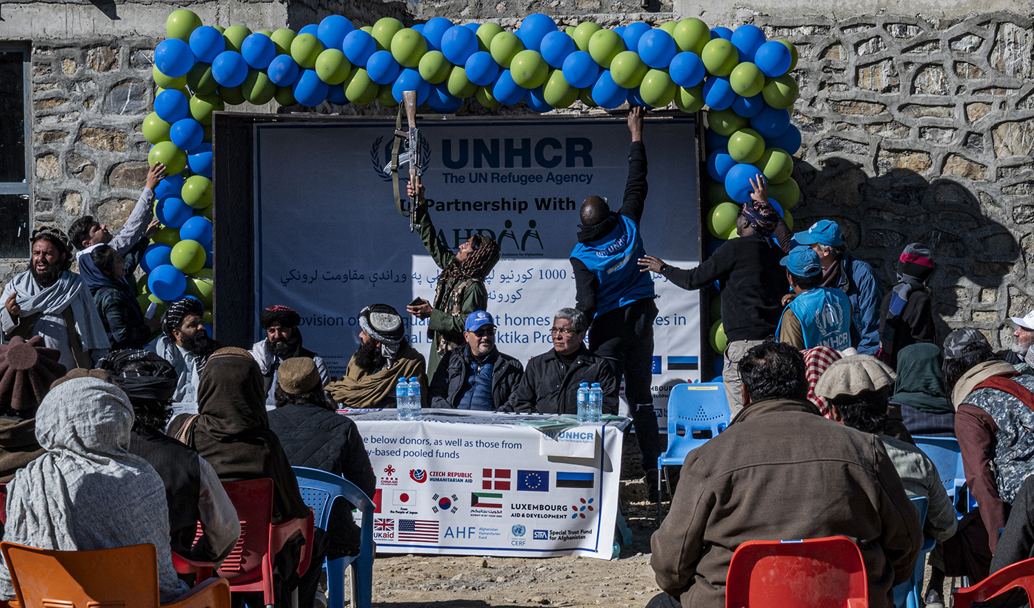 A handover ceremony of newly built houses constructed by the United Nations refugee agency (UNHCR) in Barmal district in Afghanistan's Paktika province on December 15, 2022. (AFP/File)