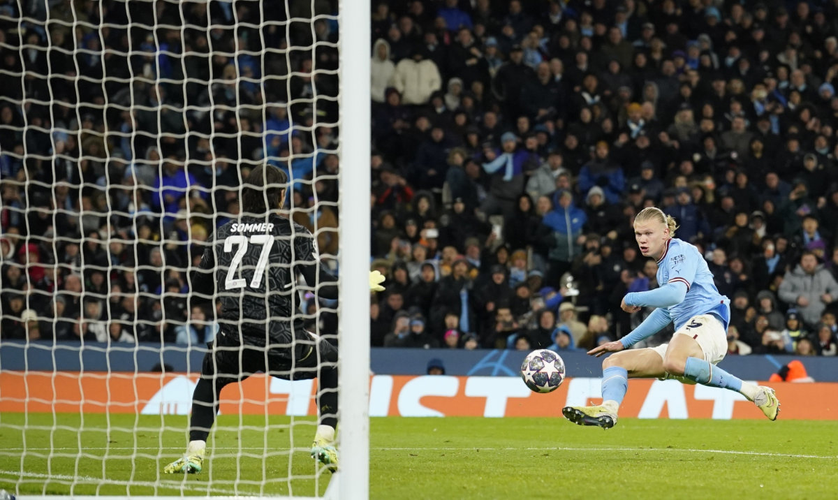 Manchester City's Erling Haaland scores his side's third goal during the Champions League quarterfinal first leg between Manchester City and Bayern Munich at the Etihad stadium Tuesday. (AP)