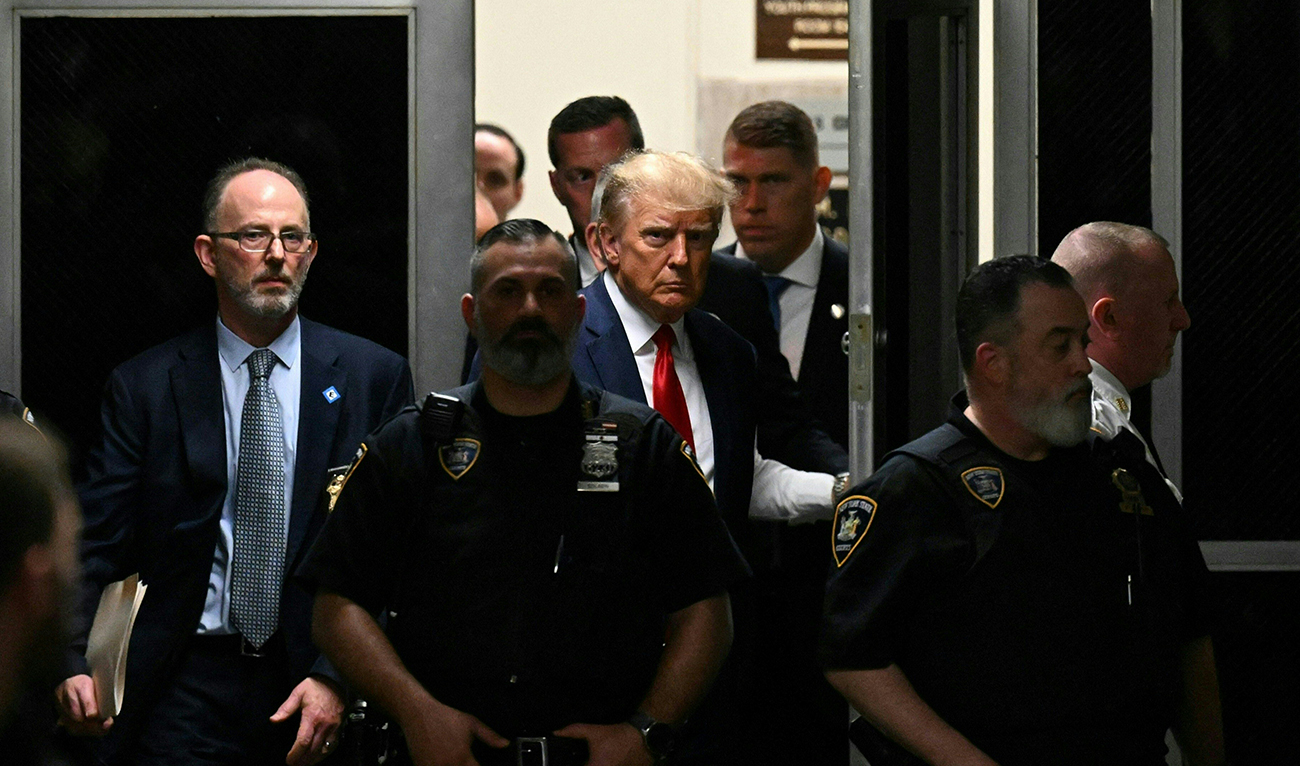 In this file photo taken on April 04, 2023, former US President Donald Trump makes his way inside the Manhattan Criminal Courthouse in New York. (AFP/FILE)