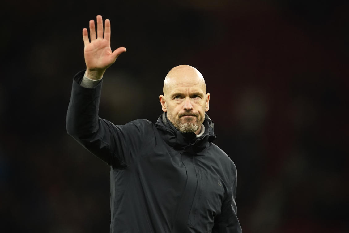 Manchester United’s head coach Erik ten Hag waves after their Europa League first leg quarterfinal match against Sevilla at the Old Trafford stadium in Manchester, on Apr. 13, 2023. (AP)