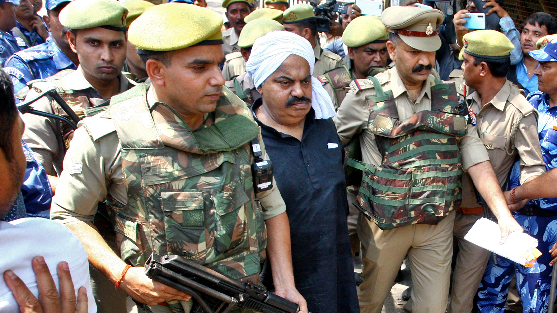 Former Indian lawmaker, brother fatally shot live on TV