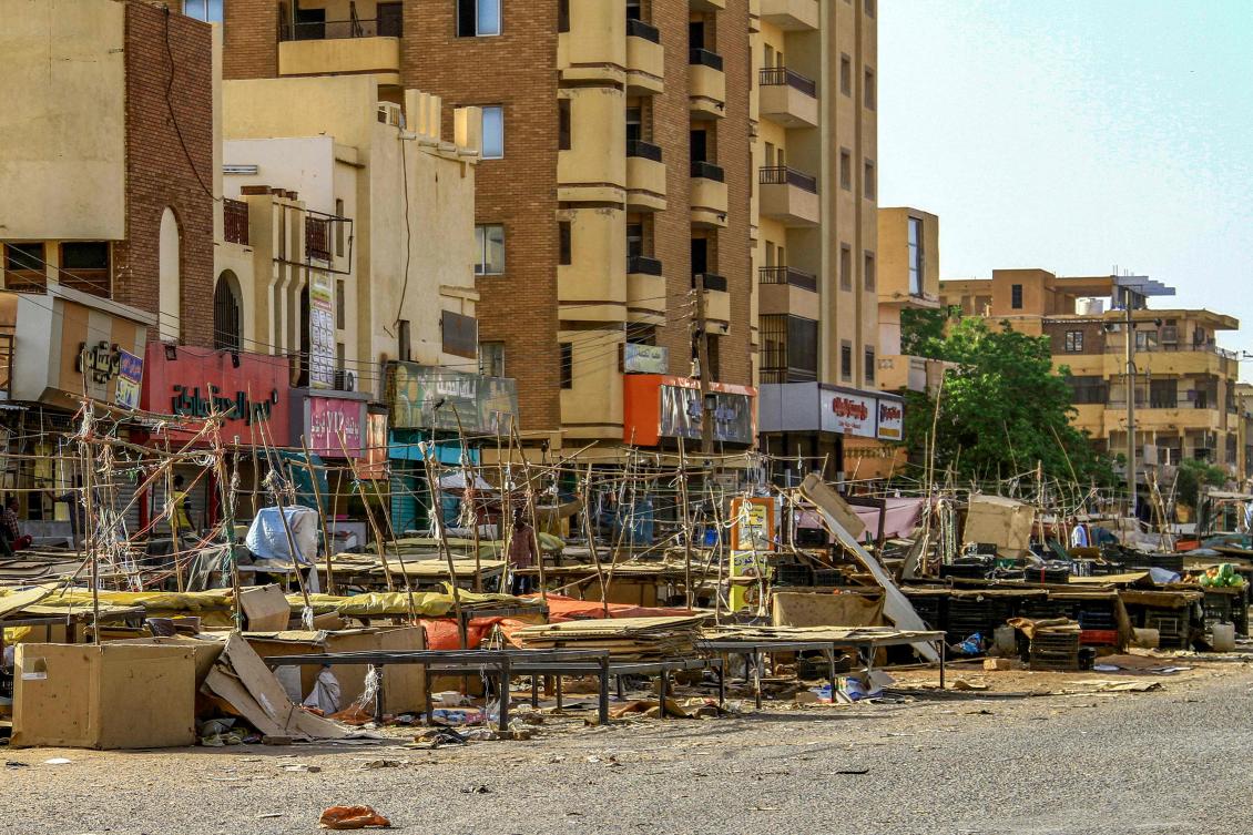 Pedlars' stalls are abandoned along a street market in the south of Khartoum on April 17, 2023 as fighting in the Sudanese capital between the army and paramilitary forces led by rival generals rages for a third day. (AFP)