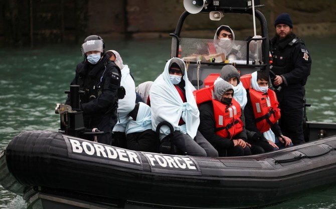 Migrants arrive into the Port of Dover onboard a Border Force vessel after being rescued while crossing the English Channel, in Dover, Britain, Dec. 17, 2021. (File/Reuters)