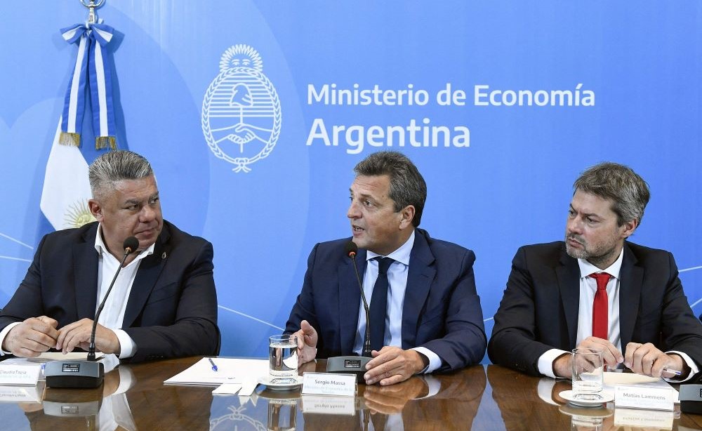 Argentine FA President Claudio Tapia, left, Economy Minister Sergio Massa, center, and Tourism & Sports Minister Matias Lammens announce the FIFA U-20 World Cup hosting. (Twitter/@Economia_Ar)