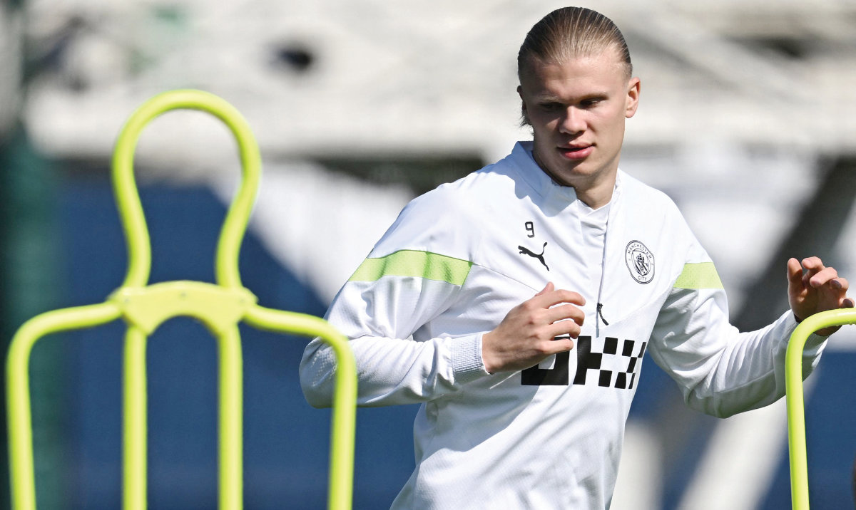 Manchester City’s Norwegian striker Erling Haaland attends a team training session at Manchester City training ground in Manchester, northwest England on Tuesday, on the eve of their UEFA Champions League quarterfinal against Bayern Munich. (AFP)