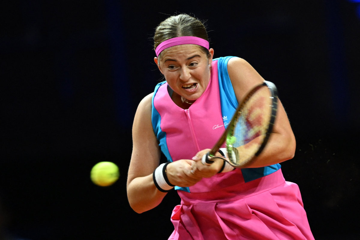 Latvia's Jelena Ostapenko in action during her round of 32 match against Britain's Emma Raducanu in the Stuttgart Open tennis tournament a Porsche Arena, Stuttgart, Germany, on Tuesday. (Reuters)