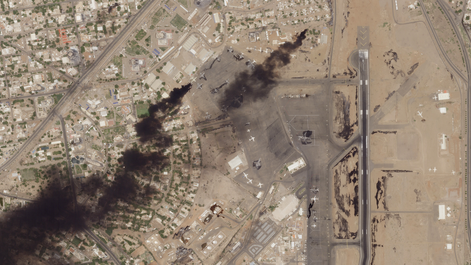 This satellite photo from Planet Labs PBC shows fires burning at Khartoum International Airport in Khartoum, Sudan, Wednesday, April 19, 2023. (AP)